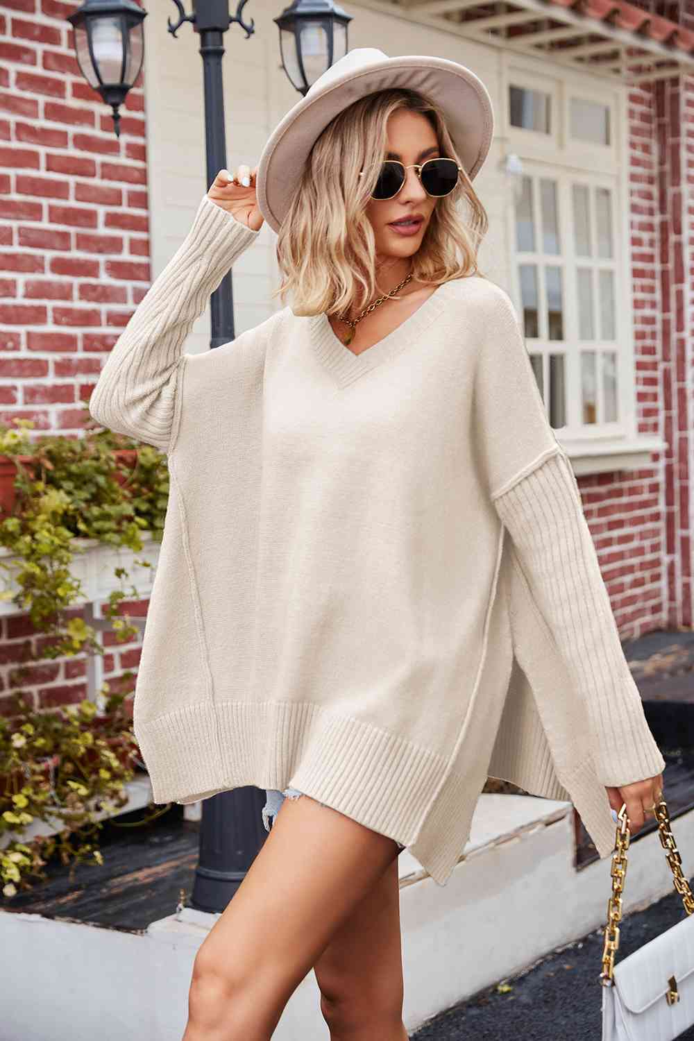V-Neck Slit Exposed Seam Sweater - Lola Cerina Boutique
