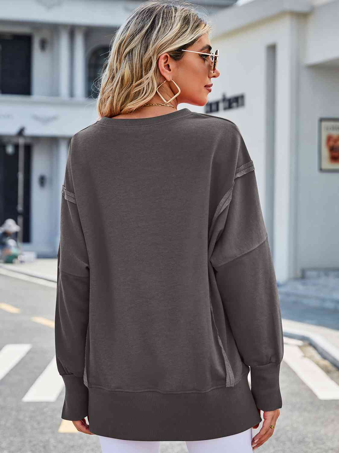 Exposed Seam High-Low Round Neck Sweatshirt - Lola Cerina Boutique